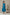 Hand Embroidered Handloom Cotton Dress with Floral Motifs in Teal Blue – Suchi