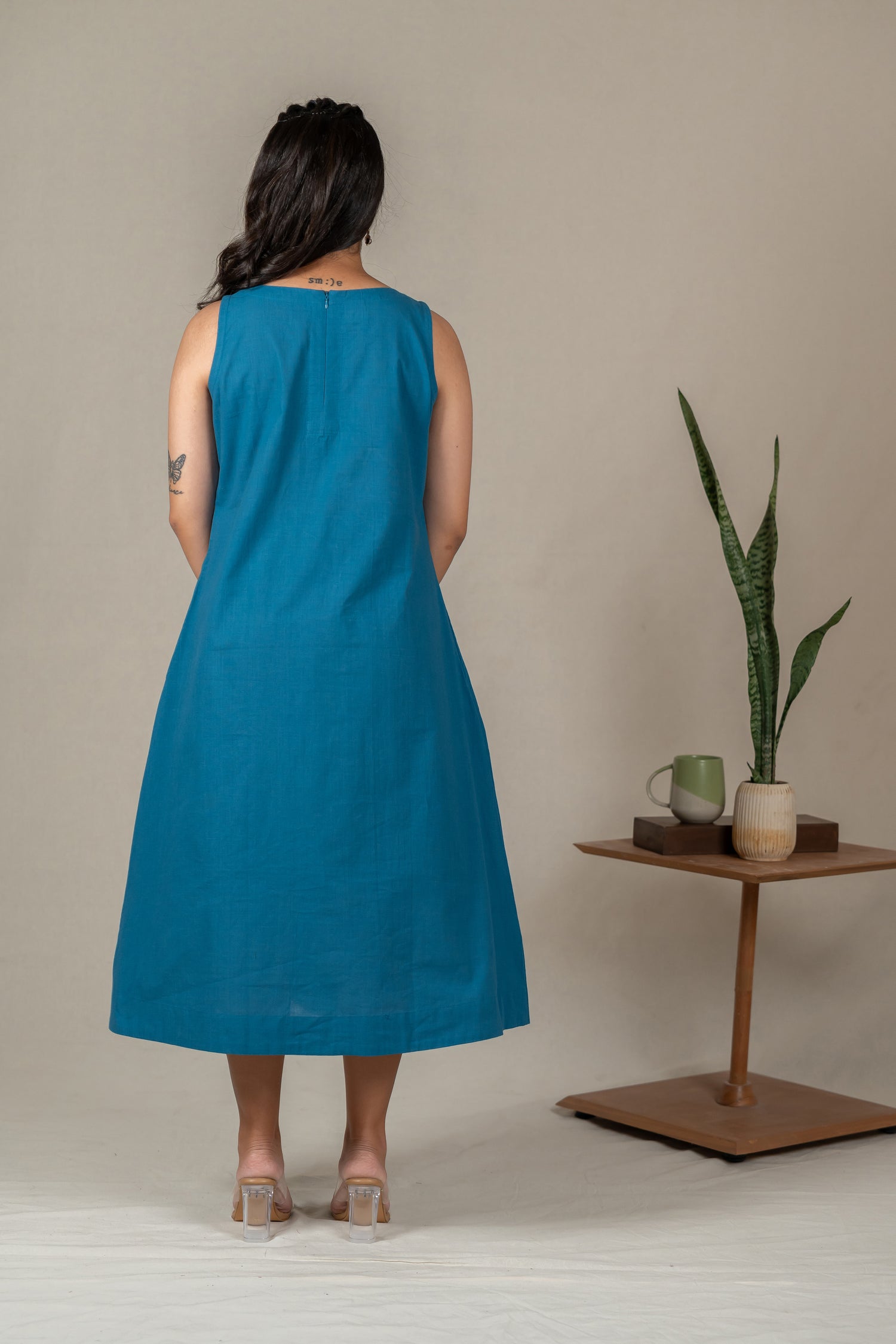 Hand Embroidered Handloom Cotton Dress with Floral Motifs in Teal Blue – Suchi