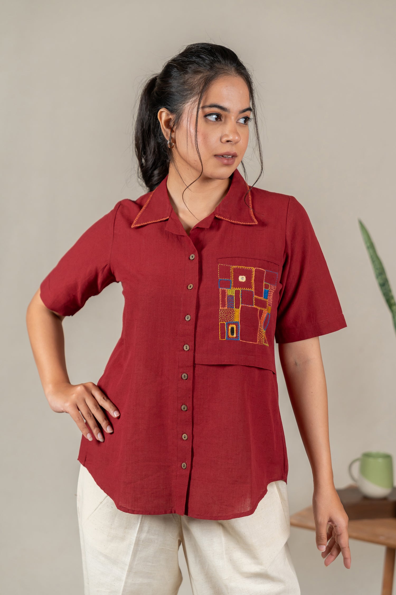 Hand Embroidered Cotton Shirt with Apple-Cut Hem in Maroon – Suchi
